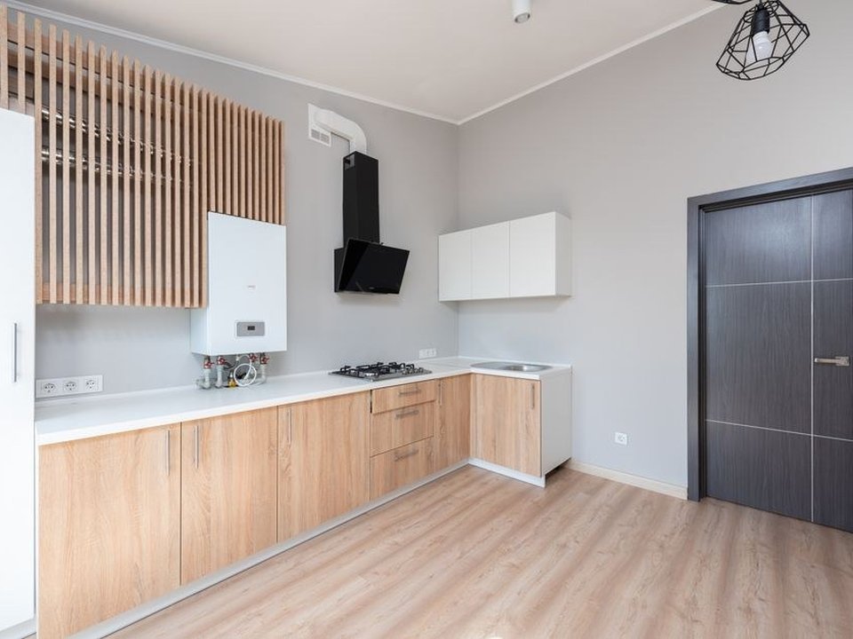 Chaudière gaz murale dans la cuisine d'un appartement de la Guillotière à Lyon 7