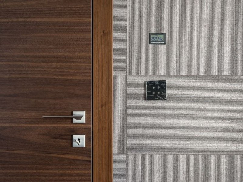 Volet roulant connecté et commande domotique posés dans un logement neuf d'un programme récent de Décines
