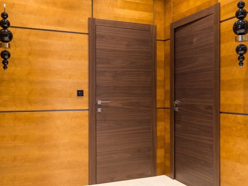 Portes en bois à âme isolante posées dans une maison de Sainte-Catherine