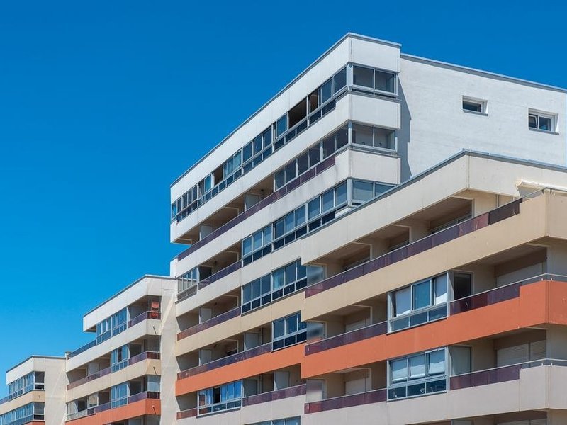 Programme immobilier récent à Sathonay-Camp dont les appartements neufs sont remis en peinture après livraison