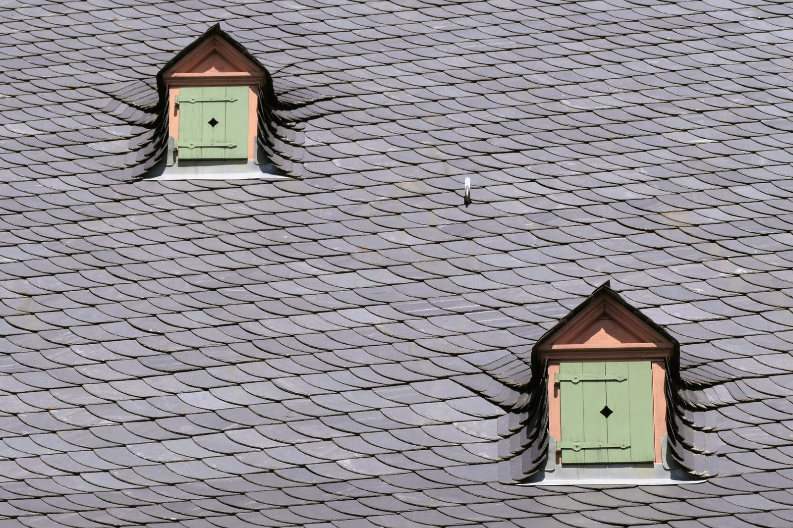 Réfection d'une toiture en ardoise à Lyon avec lucarnes